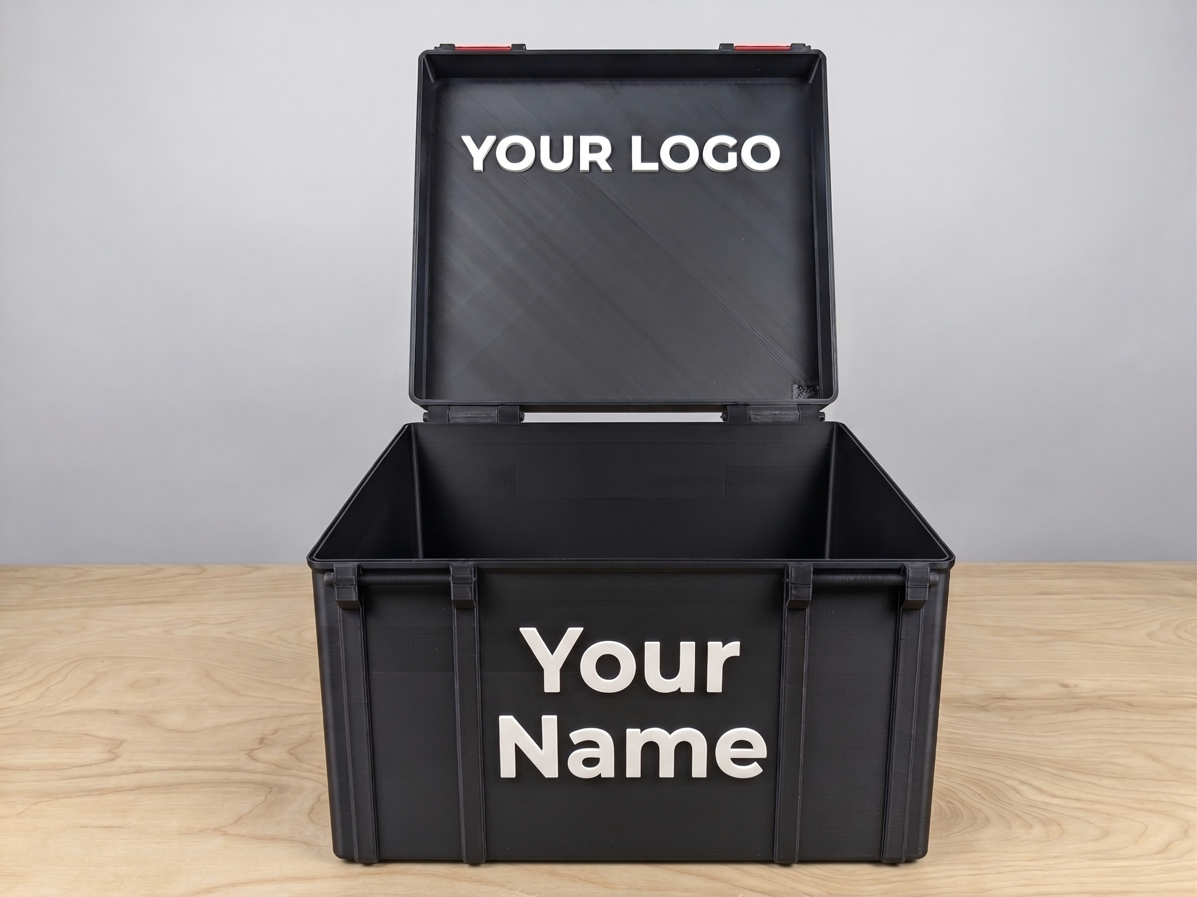 Assista personalized tool box open showing custom logo on lid and name on front